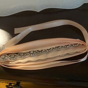 Women’s silk belt in a light peach. Brand new.